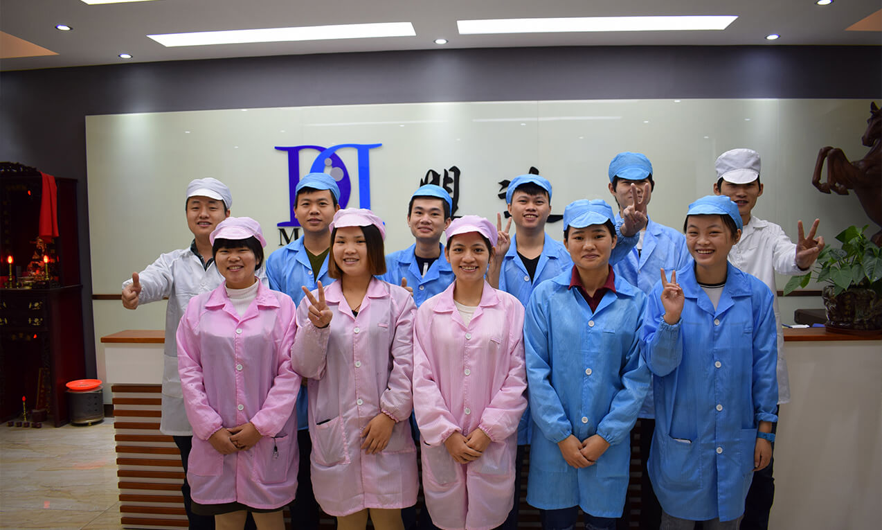 mondo_our-team-2 The photo shows a group picture of the quality control team responsible for product quality at Mondo Company.